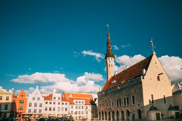 Fototapeta premium Tallinn, Estonia. Famous Old Traditional Town Hall Square In Sunny Summer Evening. Famous Landmark And Popular Place. Destination Scenic
