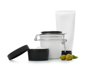 Different body cream on white background