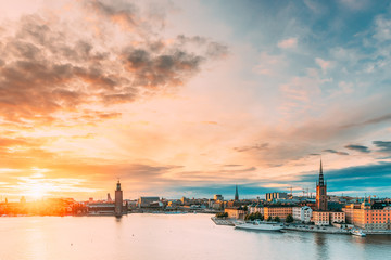 Fototapeta premium Stockholm, Sweden. Scenic Famous View Of Embankment In Old Town Of Stockholm At Summer. Gamla Stan In Summer Evening. Famous Popular Destination Scenic Place And UNESCO World Heritage Site
