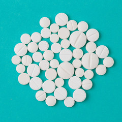 white  tablets on blue  background - Image .