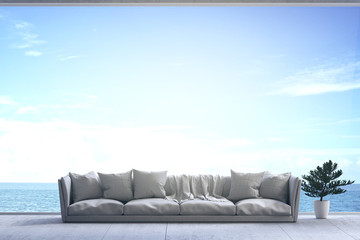 3D Rendering : illustration of soft couch sofa in wide window glass view living room interior. sea view living room. modern loft cement concrete building room. rest area of family. sofa and pillow.
