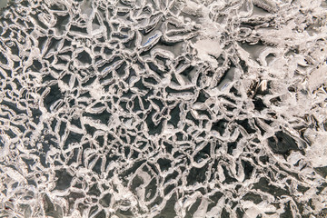 Beautiful lace ice texture. Winter abstract background