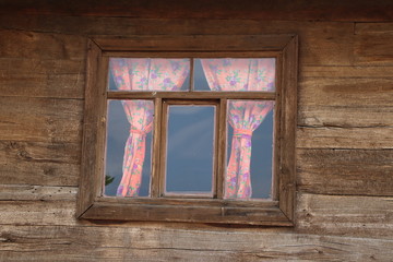 Old Window on a Wooden Wall