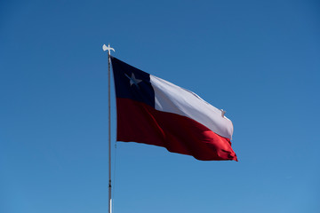 Fototapeta na wymiar Chilean Flag Flying in a Light Breeze.