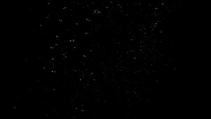 Water bubbles floating after splash underwater and black background which represent freshness of...