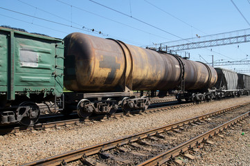 Fototapeta na wymiar Freight train on city cargo terminal