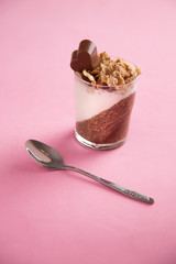 Delicious breakfast, cocoa chia pudding with yogurt and cereals