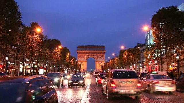 Triumphal Arch and Champs Elysees at night, Paris, France