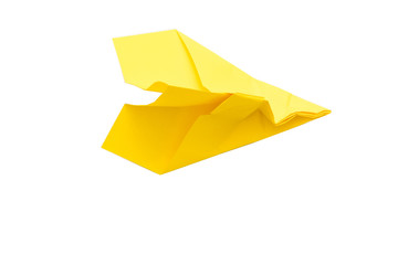 Never give up. Yellow wrinkled paper airplane isolated on white background. Copy space.