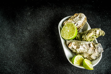 Fresh oyster clams with lemon