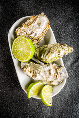 Fresh oyster clams with lemon