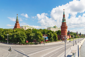 View of Moscow Kremlin in sunny summer morning against blue sky with white clouds