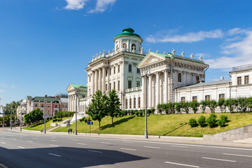 Pashkov House on Vozdvizhenka street in Moscow against blue sky with white clouds in sunny morning. Architecture of the historical center of Moscow