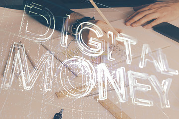 Man's hands working with notes background. Cryptocurrency and finance concept.