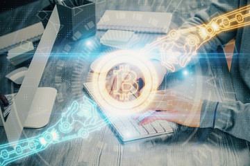 Blockchain theme hud with businessman working on computer on background. Concept of crypto chain....