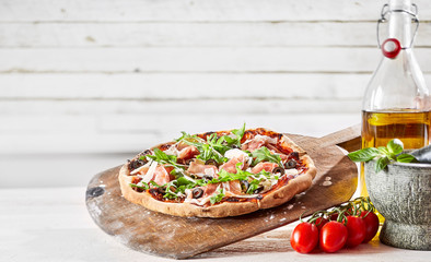 Speciality prosciutto and rocket Italian pizza