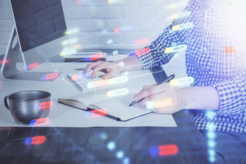 Businessman working on DeskTop with technology theme drawing. Concept of big data. Double exposure.