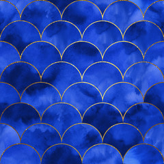 Luxury fish scale seamless pattern. Golden sea waves on blue watercolor texture. © Oleksandra