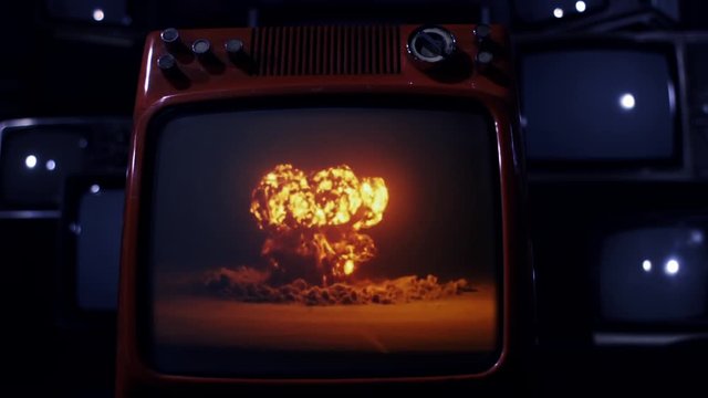 Atomic Nuclear Bomb Testing On Retro Television Set. Blue Dark Tone. 
