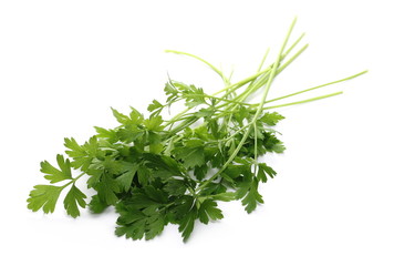 Fresh green parsley leaves isolated on white background