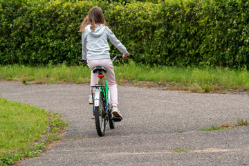 Girl riding a bicycle