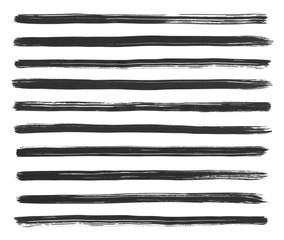 Collection of hand drawn black grunge brushes isolated on white.
