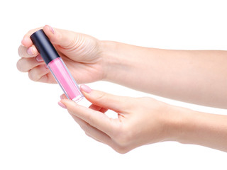 Pink lip gloss in hand beauty on white background isolation