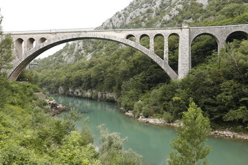 Solkan stone railway bridge in Slovenia over the river Soсa