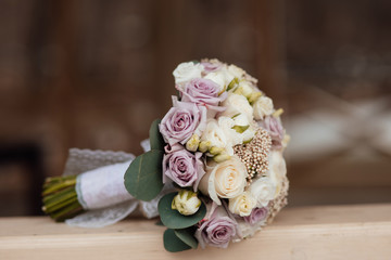 Wedding bouquet. Bride's flowers. close up of wedding bouquet. A beautiful colorful wedding bouquet for the bride. Details for marriage, and for spouses.