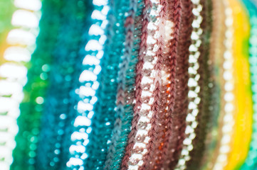 Women's hobby. Bright crochet colorful scarf. Knitting and crocheting . Texture. Background