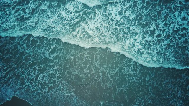Aerial Dron Shot of the Baltic Sea Costline With Waves View From Above. Sea Waves Over a Sandy Beach. Top View of Sea Waves Foaming and Splashing, Big Waves From Above	