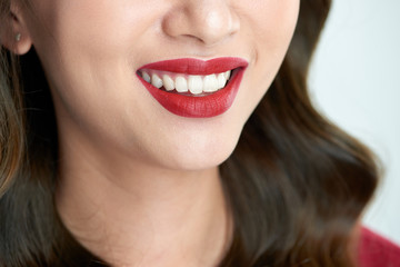 Sexy sensual red lips with mouth open. Beautiful lips Makeup. Close up red lips of asian girl.