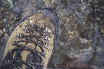  Mountain boot in the rain of swiss alps