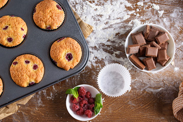 Delicious and fragrant muffins with raspberries and chocolate.