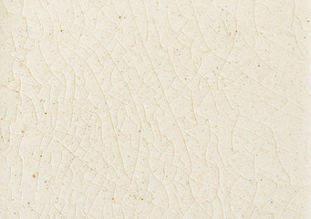 background and texture of stretch marks cracked on white cream glazed tile