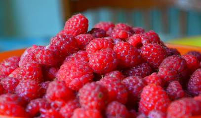 Slide of ripe delicious raspberry. Harvested crop. Summer brought its gifts. Close up.