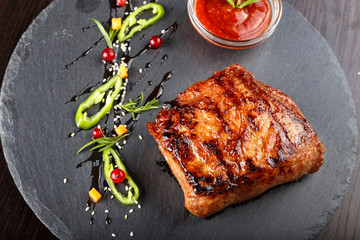 Steak on slate blackboard
