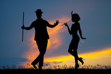 Naklejka premium mężczyzna i kobieta tańczą Charleston