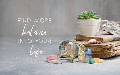 find more balance into your life - motivation quote. Beautiful gemstones minerals for relaxation, meditation. Rock crystal, fluorite, citrine, charoite, rose quartz. Crystal Ritual. selective focus