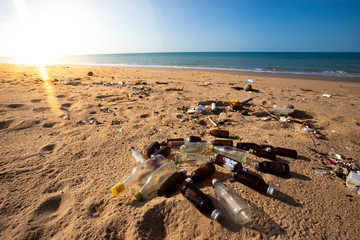 Fototapeta na wymiar bottles and garbage waste on the beach