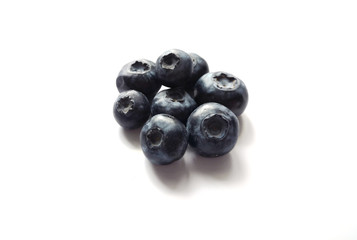 Blueberry on white background top view with copy space.