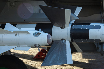 Bomb and missile on a fighter bomber plane. Armament of the aircraft. Aircraft missile launcher....