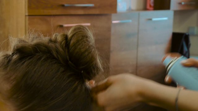 The girl is covered with lacquer hair