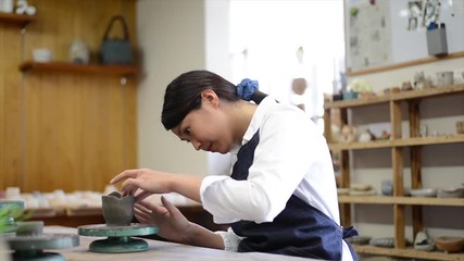 Japanese student in pottery class