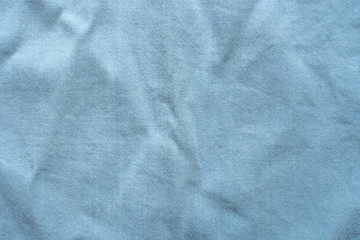 Texture of a Blue Slightly Rumpled Shirt. Empty Backdrop