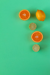 Conceptual bright colorful background with multicolour citrus. space for text. 