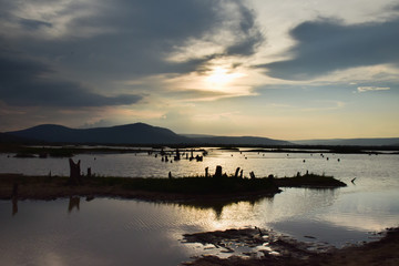 Silhouette of lake and mountain view in nature isolated with background.