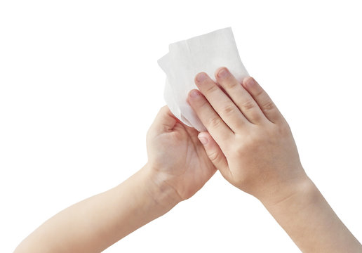 The Child Wipes, Cleans His Hands With A Wet Napkin Or Wipe Isolate On A White Background