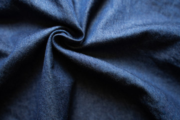 Fototapeta na wymiar Navy blue fabric texture background top view.
