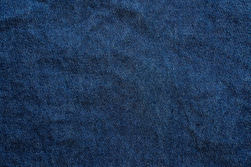 Navy blue garment fabric texture.